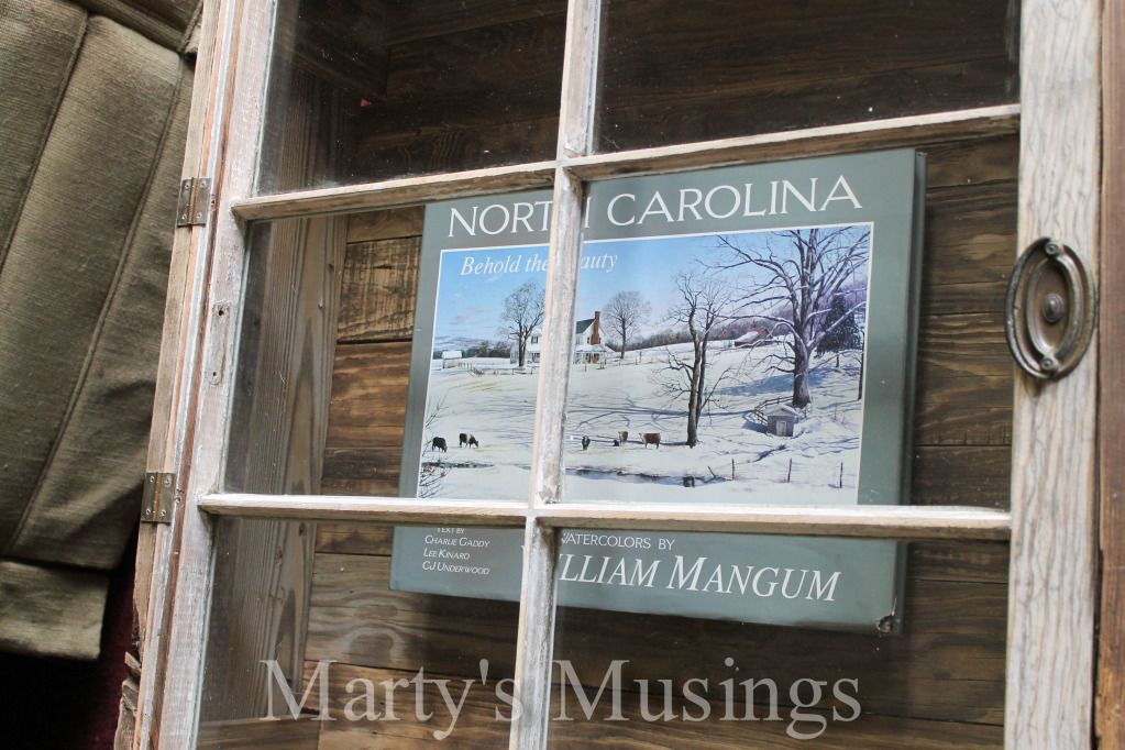 A wooden sign on a window