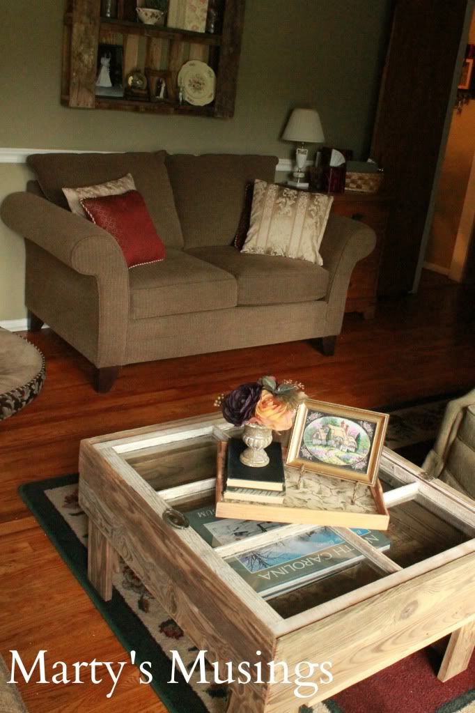 A room filled with furniture and a box on a table