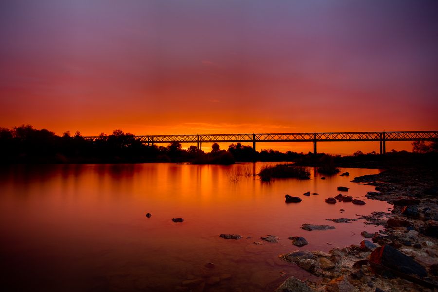 Stunningly wet sunrise overlooking the famous Algebukina Bridge on the Oodnadatta track